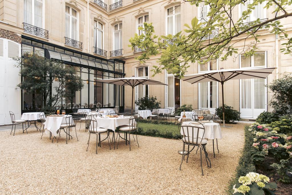 Photo of outdoor terrace with seating at Hotel Alfred Sommier located in Paris.