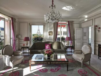 Photo of guest suite at Hôtel Plaza Athénée with a stunning view of the Eiffel Tower.