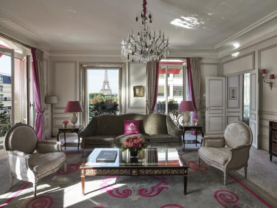 Photo of guest suite at Hôtel Plaza Athénée with a stunning view of the Eiffel Tower.