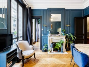 Photo of beautiful living room at an elegant apartment Airbnb in Paris.