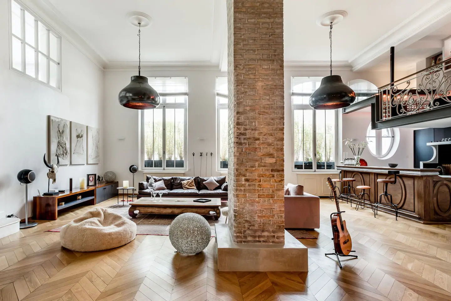 Photo of the living room inside a magnificent loft located in the Latin Quarter that is an Airbnb in Paris.
