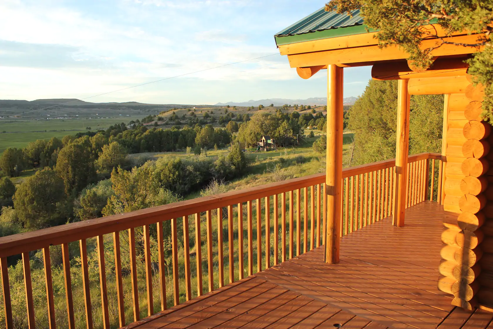 a View from the cabin deck overlooking the lush scenery 