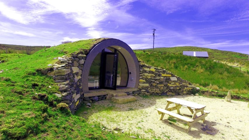 This cropped airbnb in Ireland resides under hills and mountains and is perfect for a getaway