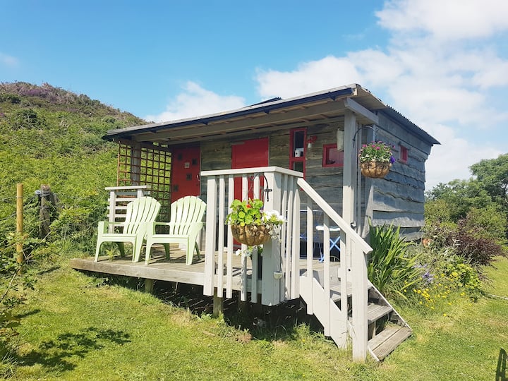 This self-contained hut has great views and rolling greens