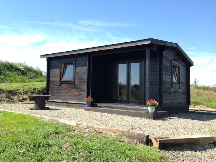 This tiny house is perfect for tiny living in vast green landscapes!