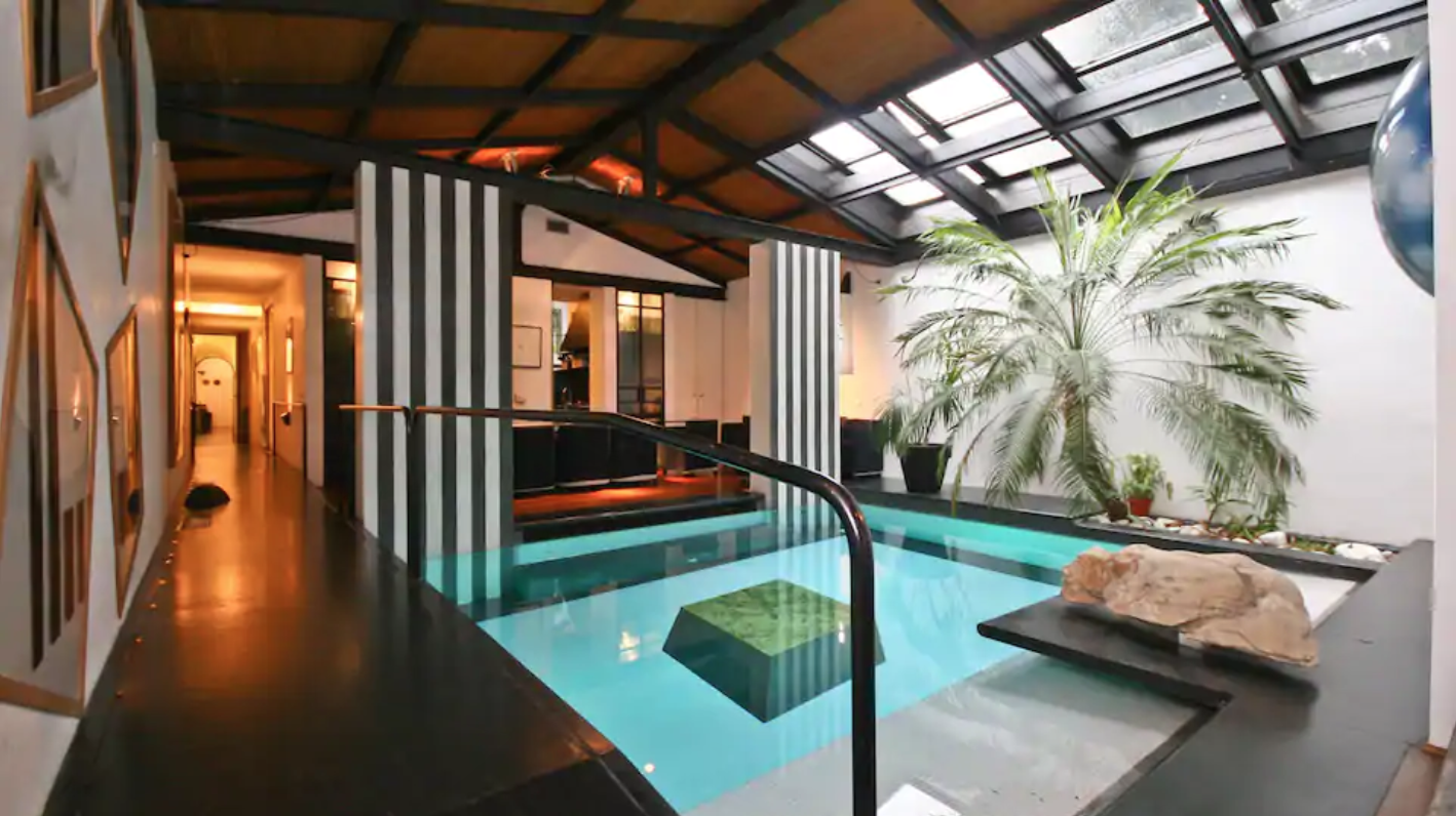 this airbnb even comes with a swimming pool in the dining room!