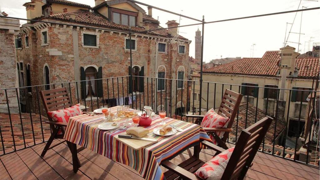 view of the rooftop terrace and beautiful venetian architecture from this vacation rental