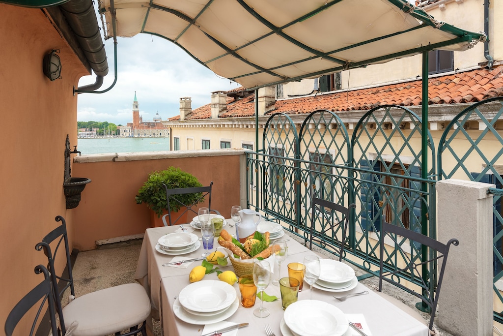 view of the san marco basin from the shady rooftop of this airbnb