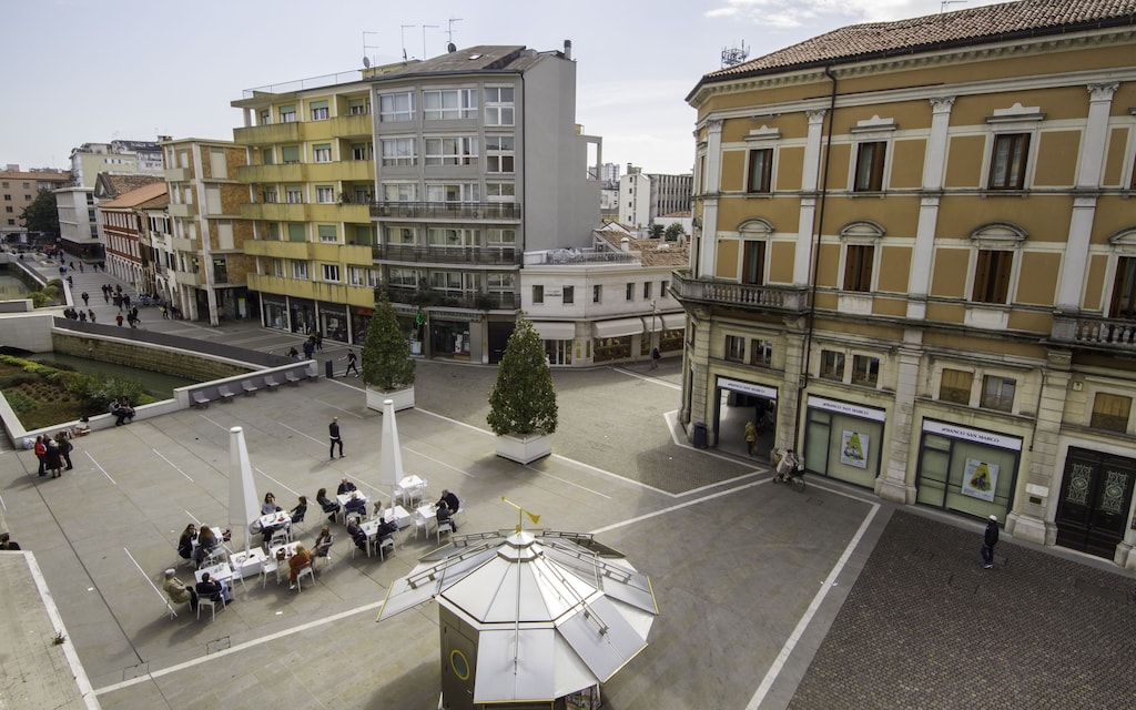 View of an old fashioned town square from this flat