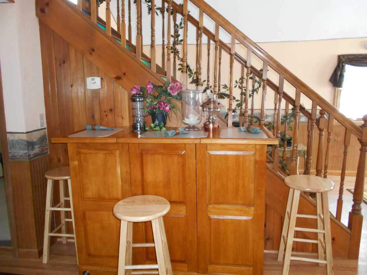 Photo of the kitchen nook in a home you can rent in the Adirondack Mountains during your New York road trip.