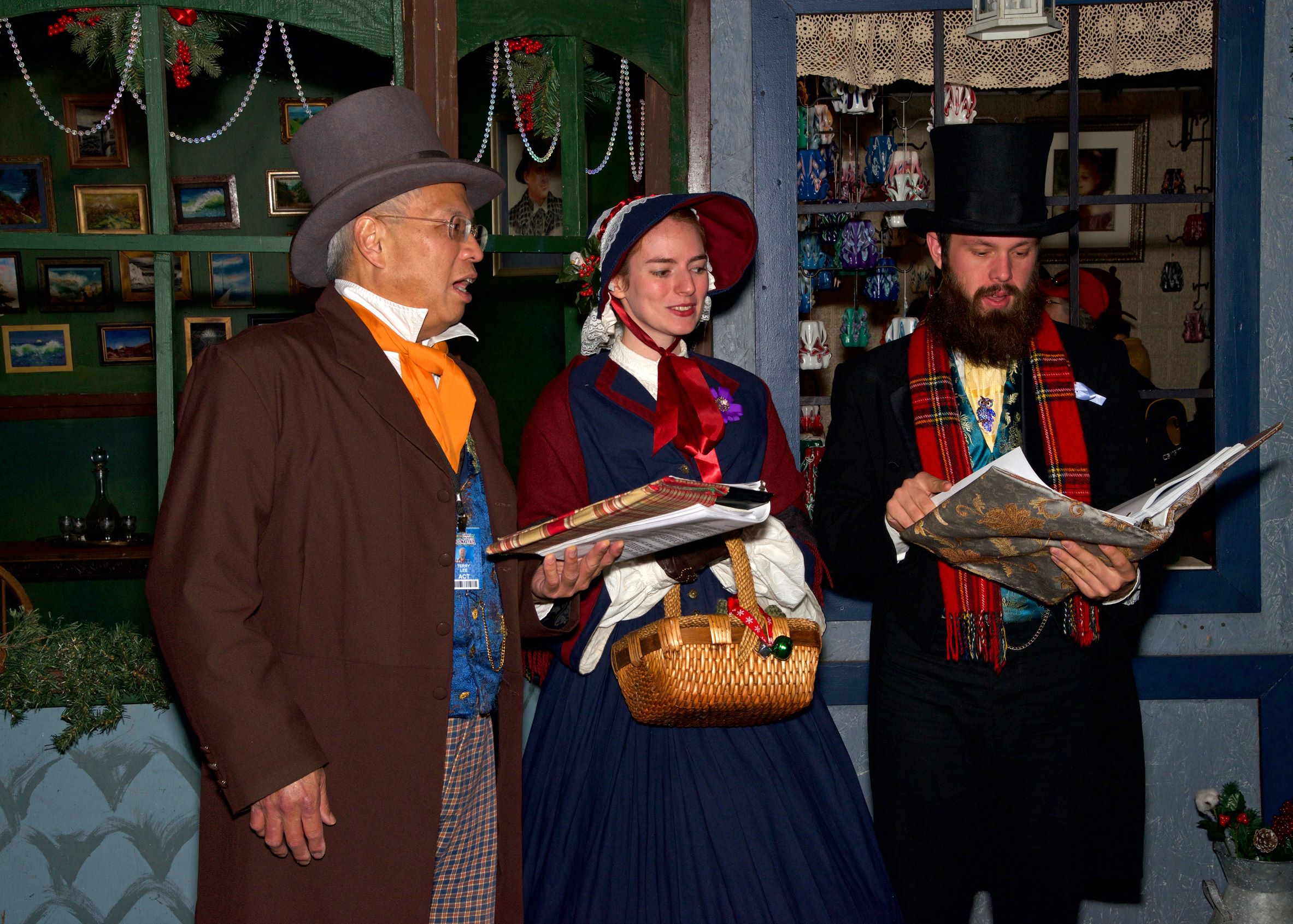 Photo of costumed Victorian carolers at the Dickens market in San Francisco.