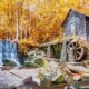 Photo of a historic mill and a waterfall in Marietta Georgia, one of the best places to experience Fall in Georgia.