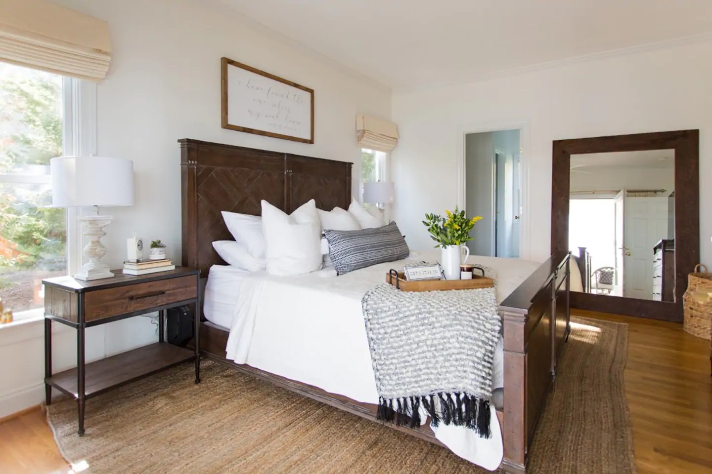 Photo of a bedroom at a North Carolina Airbnb that is a panoramic lakefront house. 