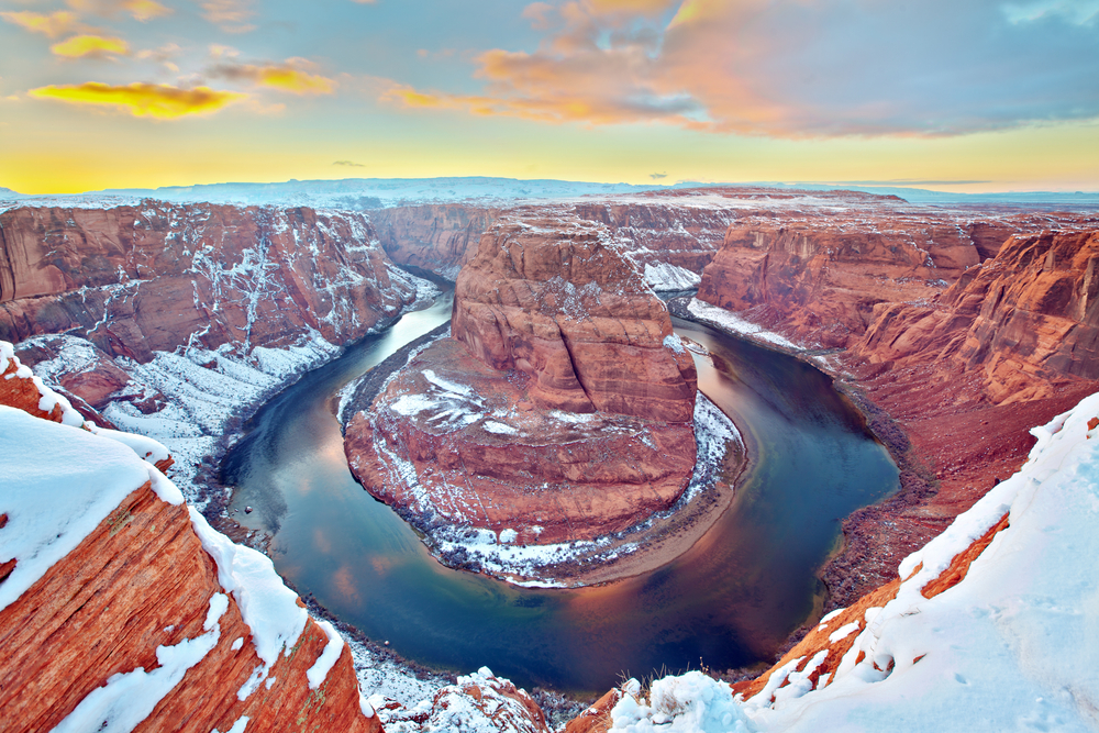 A view of the Grand Canyon in winter covered in snow