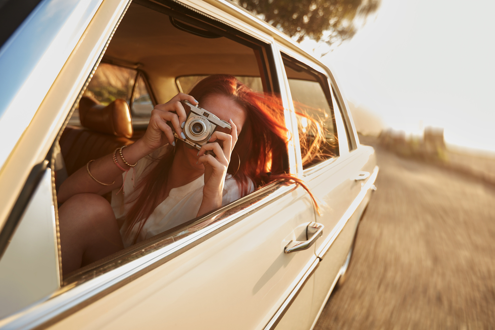 Friends take photo on road trip