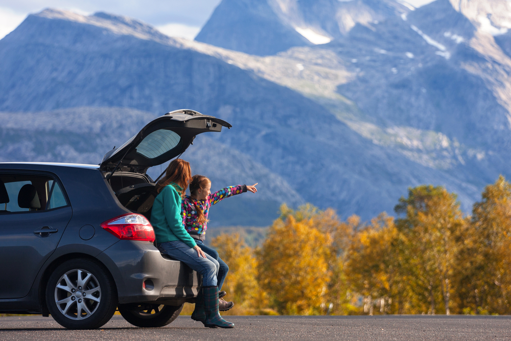 A family looks amongst a view