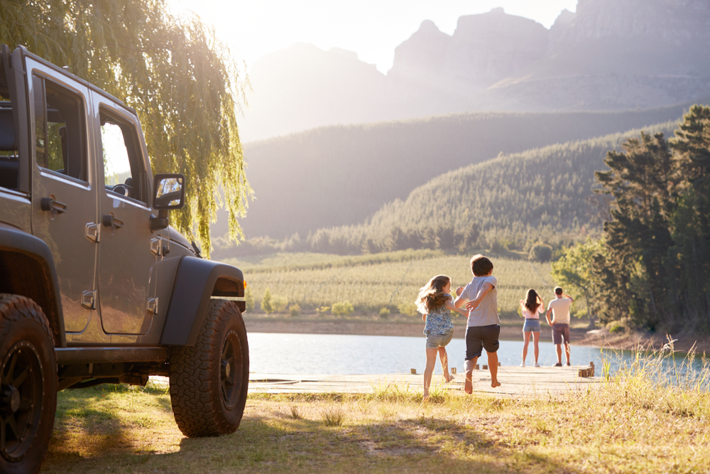 Friends and family explore the lake after parking your car