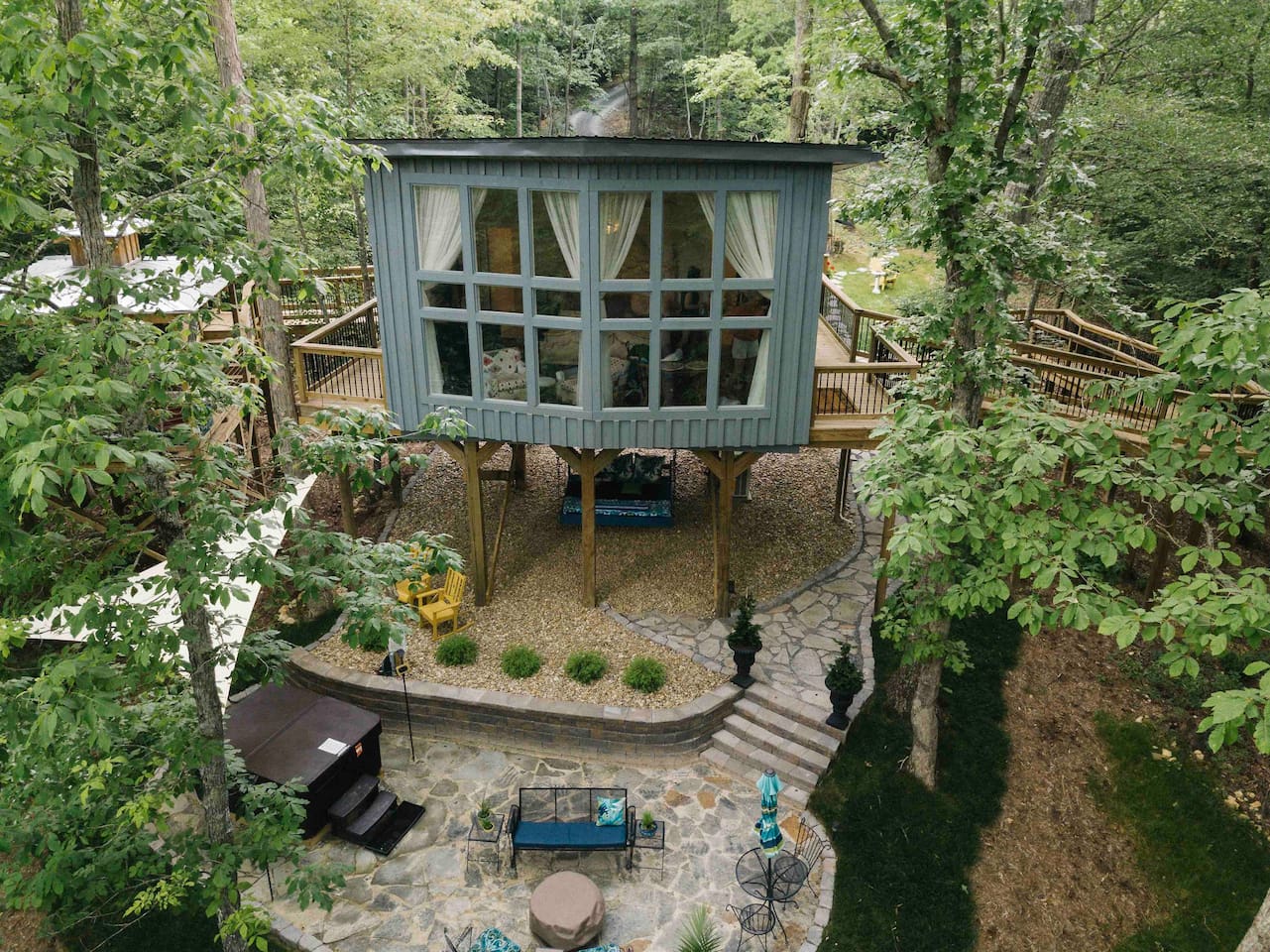 Photo of a luxury treehouse Airbnb. 