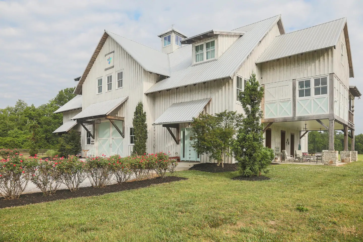 Photo of the exterior of one of the Airbnbs in Tennessee which happens to be a luxury barn.