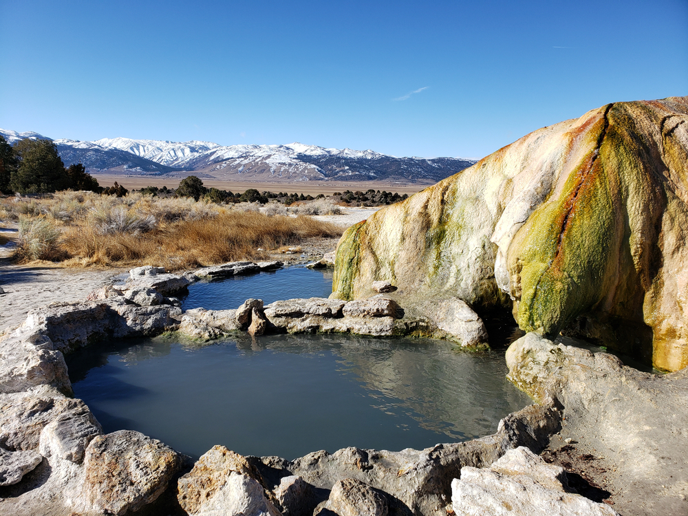 stunning mountain view of Travertine Hot Springs, one of the best natural hot springs in California