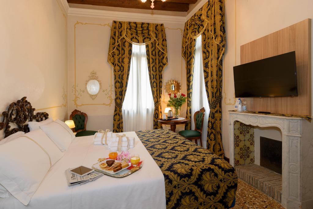 Enjoy the Venetian decor at Hotel Ala