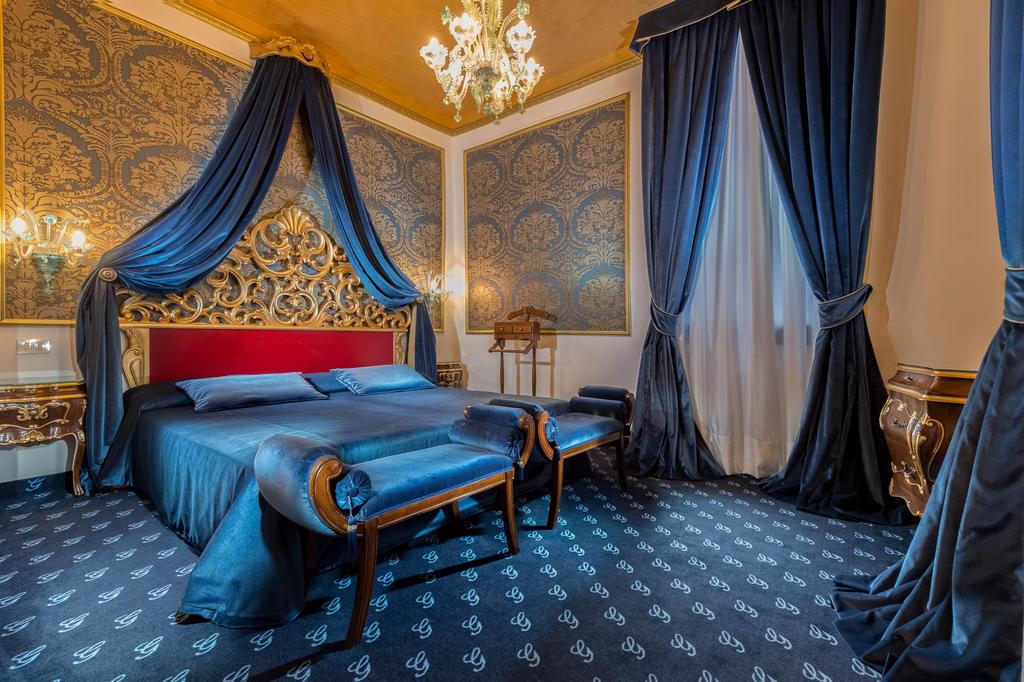 The rich colors make Hotel Giorgione one of the most gorgeous boutique hotels in Venice.