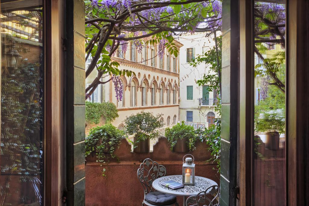 Enjoy the wisteria blooms which make Locanda Fiorita one of the prettiest boutique hotels in Venice