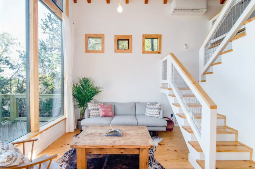 white, welcoming home interior filled with natural light cabins in the USA