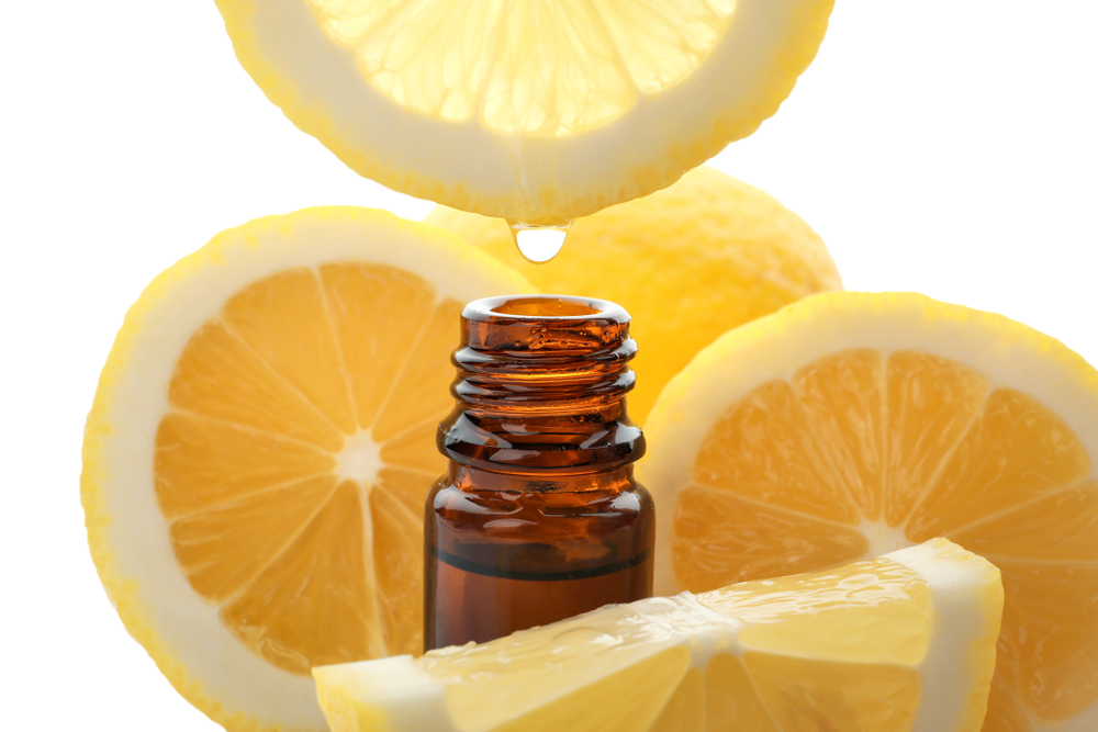 lemons dripping into a bottle