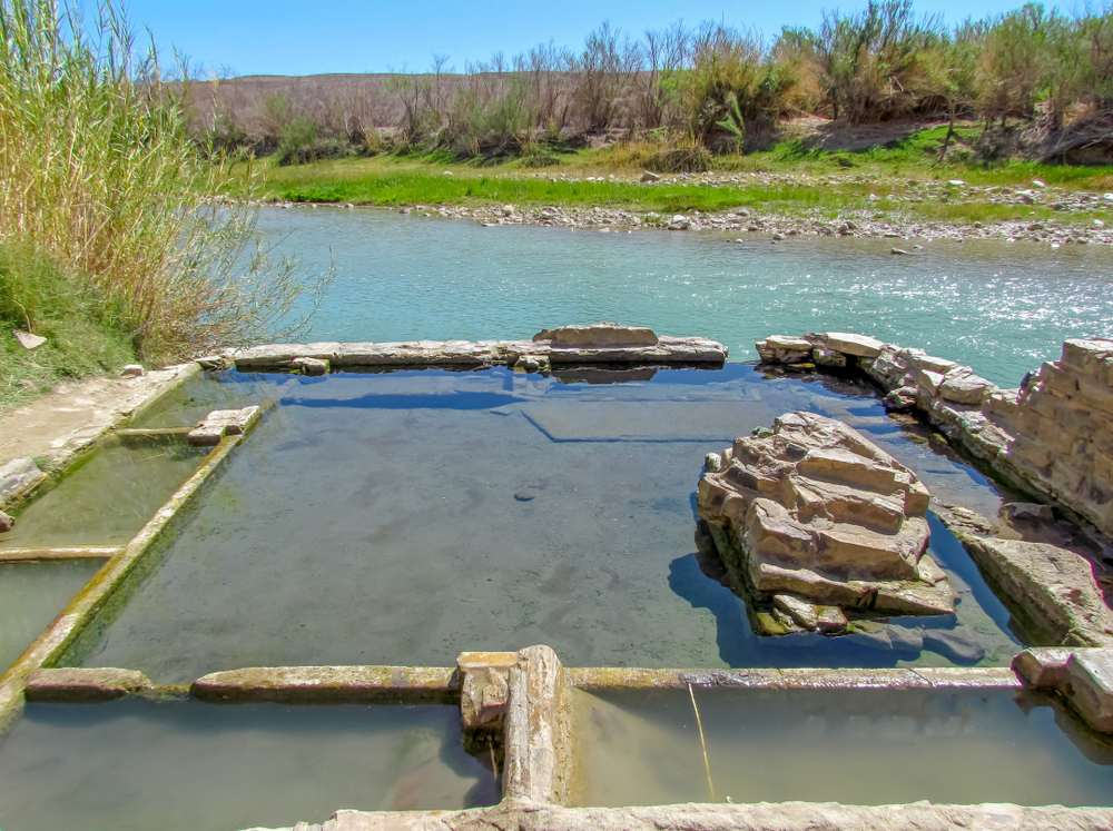 These Texan hot springs overlook the Rio Grande River and Texas desert!