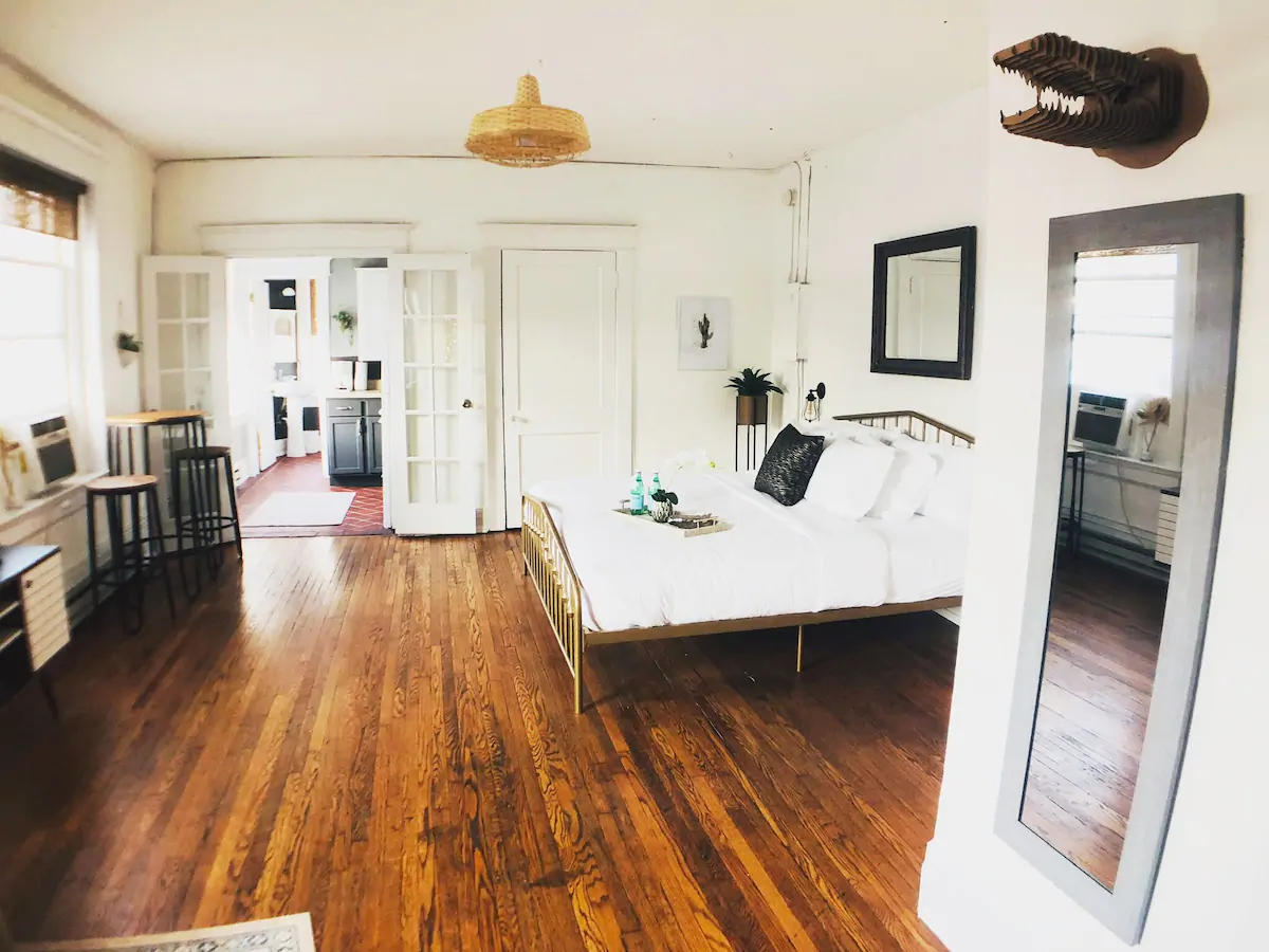 Bedroom with hardwood floors in an Airbnb in Nashville