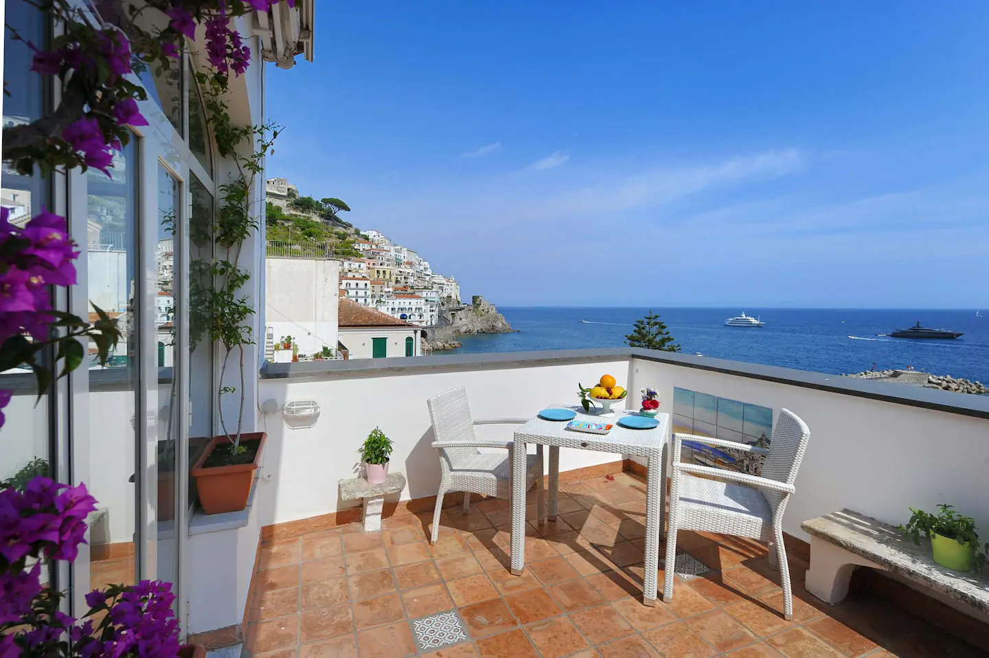 Pretty terrace on the Amalfi Coast, one of the best Airbnbs in Italy