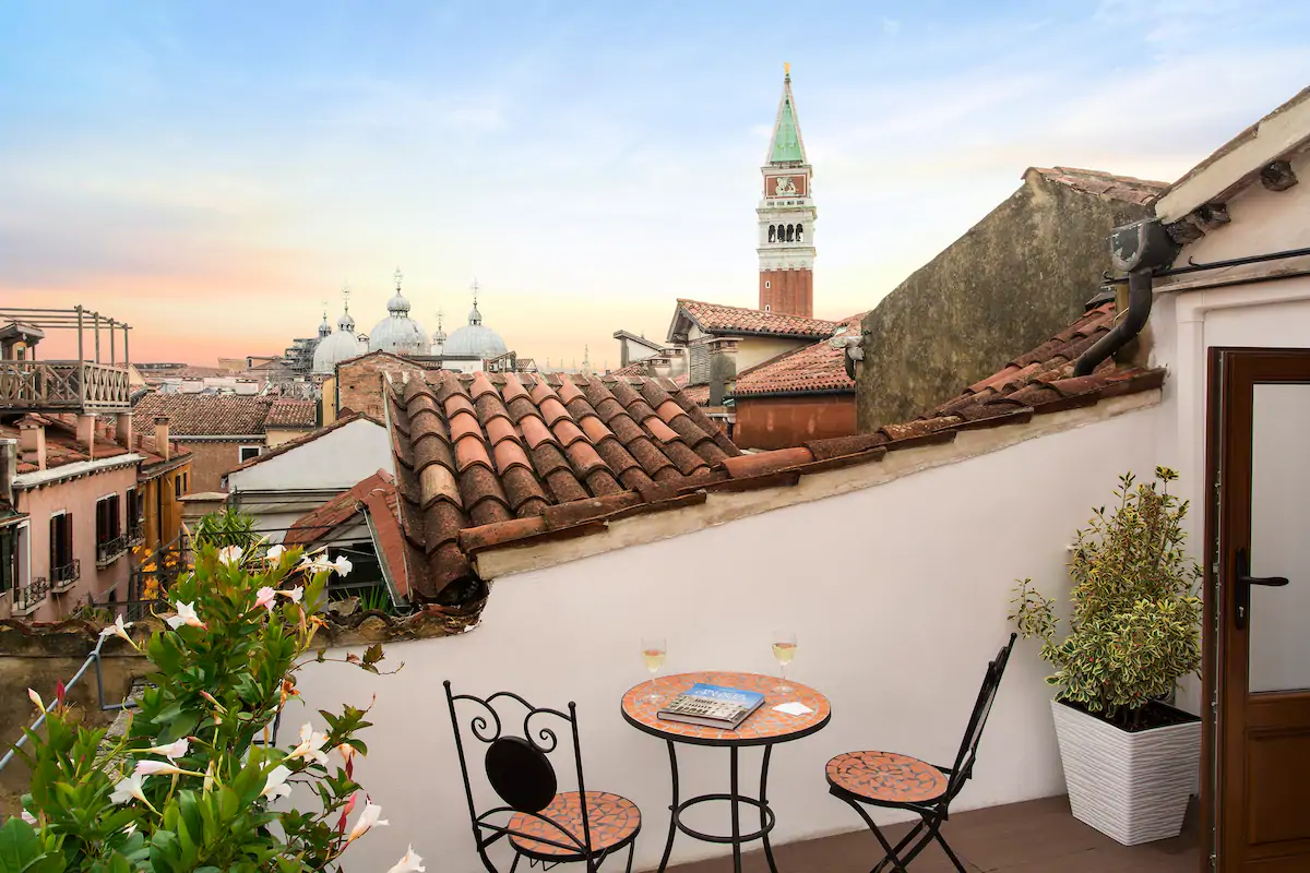 A sunset rooftop view from an Airbnb in Venice.