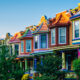 Colorful street of row homes best airbnbs in baltimore