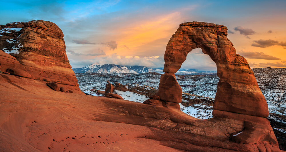 a photo of arches national park in winter, a great time to visit