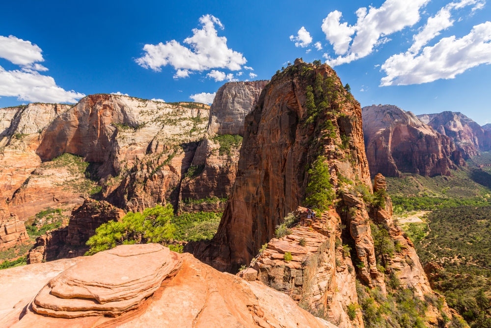 The view of Angel's Landing with large rock formations in the background, one of the best hikes in the usa