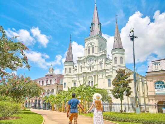 couple standing in Jackson Square New Orleans