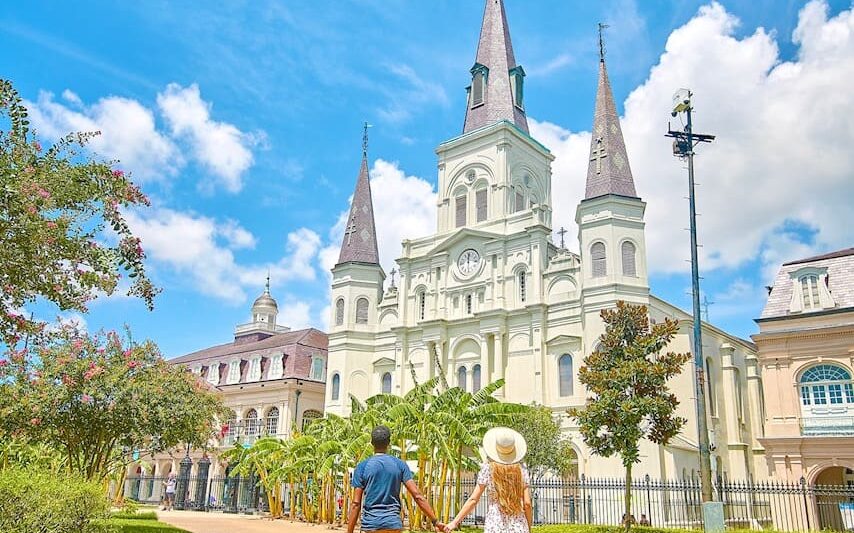 couple standing in Jackson Square New Orleans