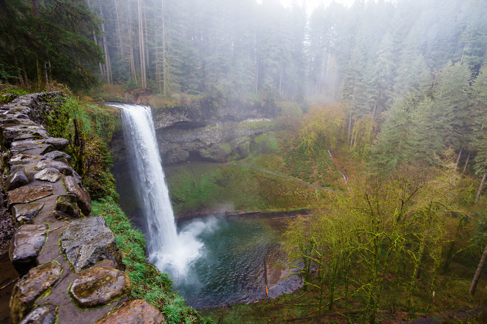 Looking down at one of the many waterfalls on the Trail of Ten Falls in Silver Falls State Park one of the best hikes in the usa