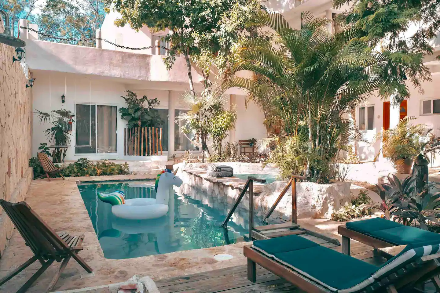 Stay at the Casita Maya Loft to enjoy one of the best Airbnbs in Tulum! This is view of the private pool and lush landscaping 