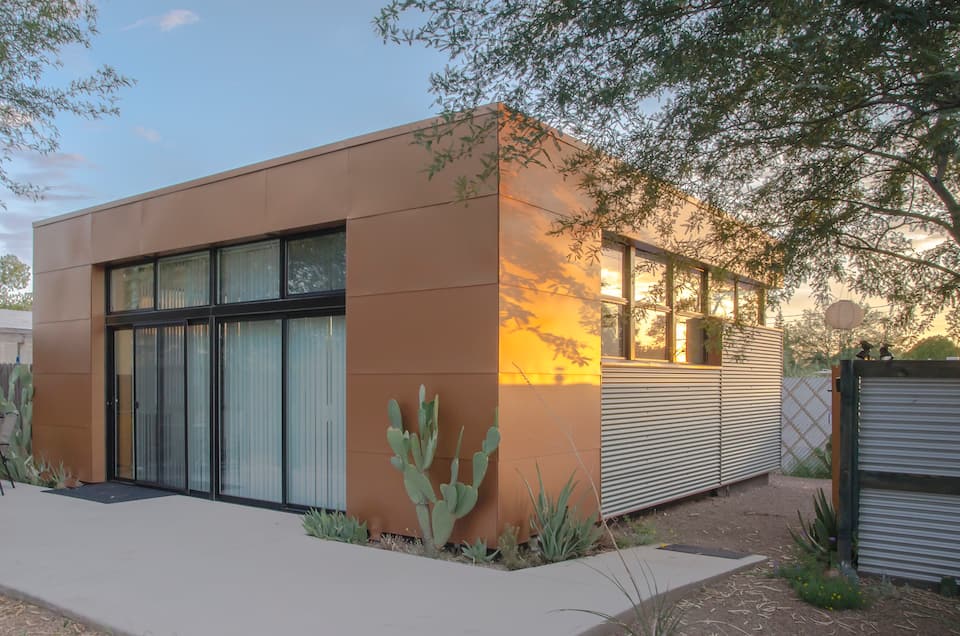 the shiny modern copper exterior of the copper house, one of the best airbnbs in tucson