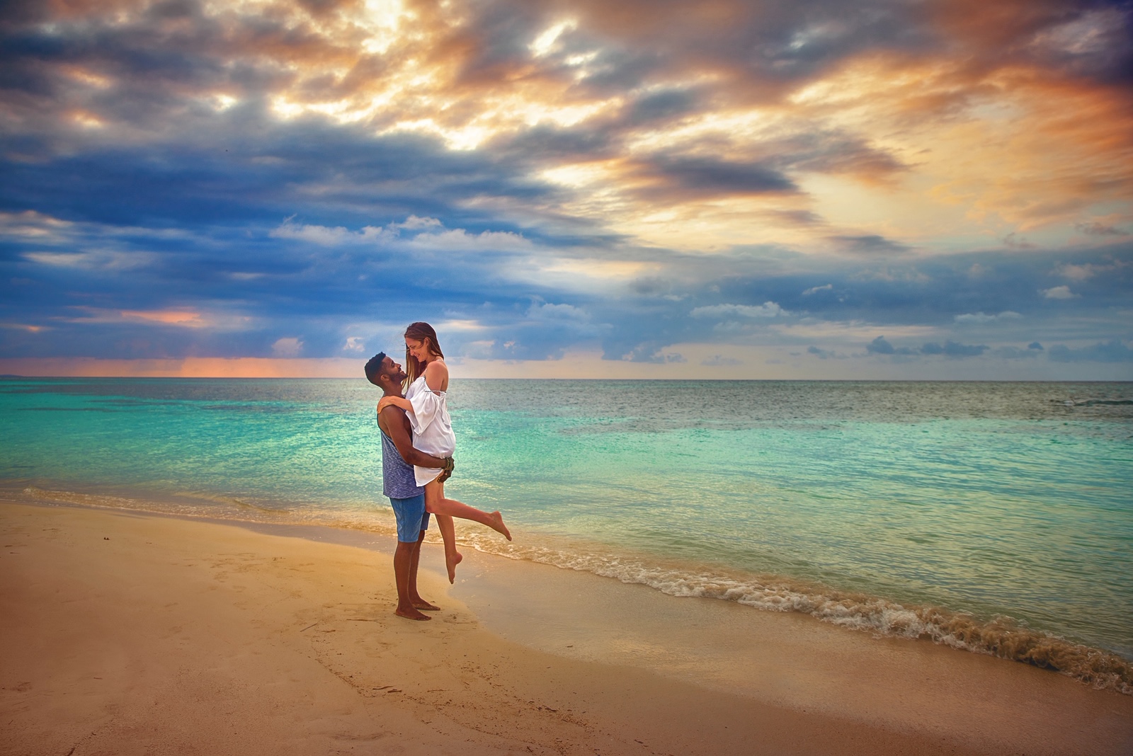 photo of a couple on a beach