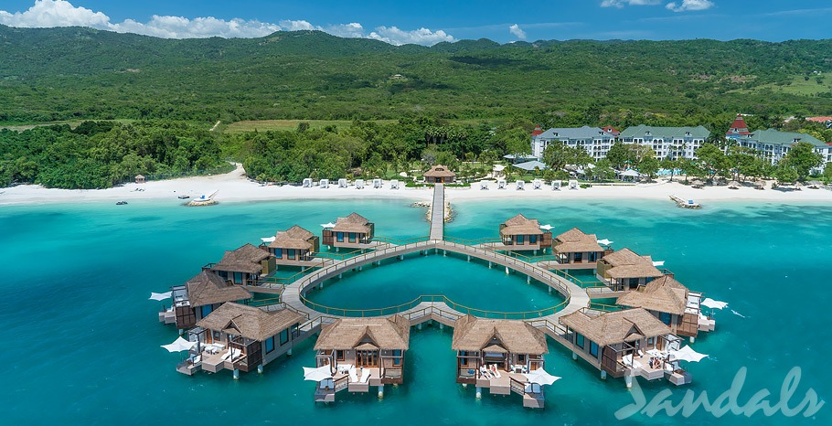 An aerial view of the overwater bungalows in the Caribbean at the Sandals South Coast Resort that are arranged in the shape of a heart