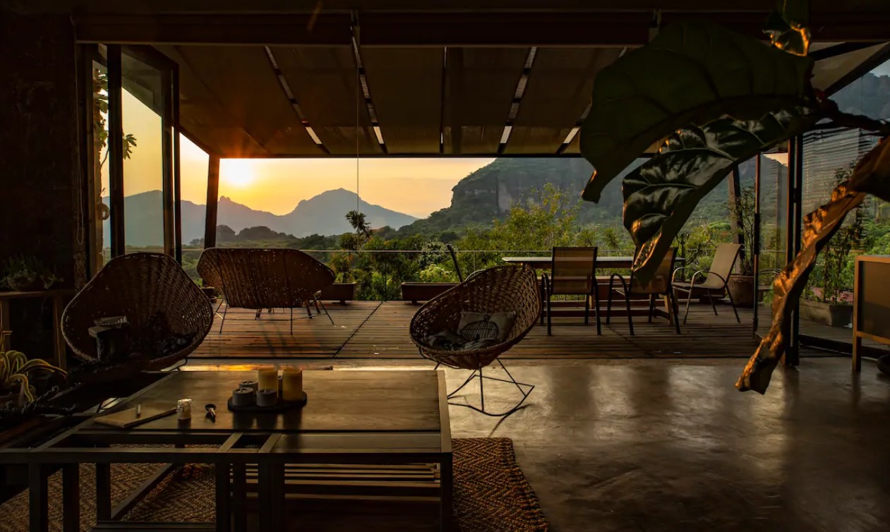 Looking out to a large terrace that over looks the mountains in Morelos Mexico airbnbs in Mexico