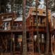 A large treehouse perched in the woods of Washington State