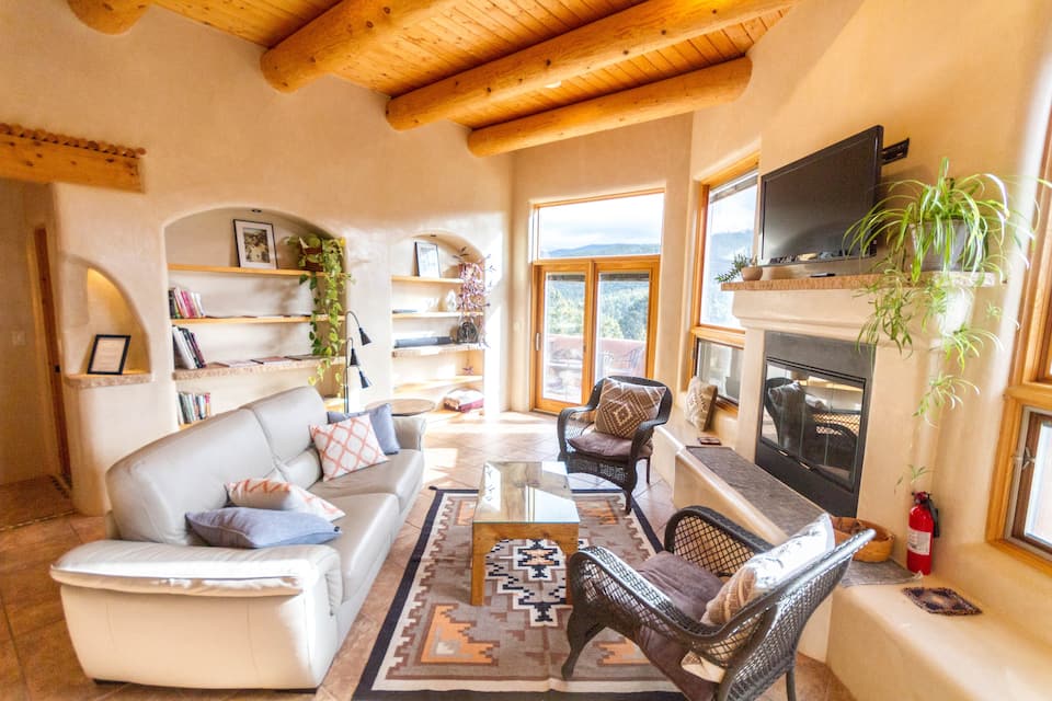 this eco home with amazing mountain views that is close to town is one of the best Airbnbs in Santa Fe