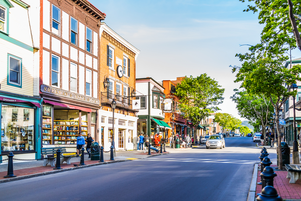 A pretty street full of colorful shops in Bar Harbor Maine