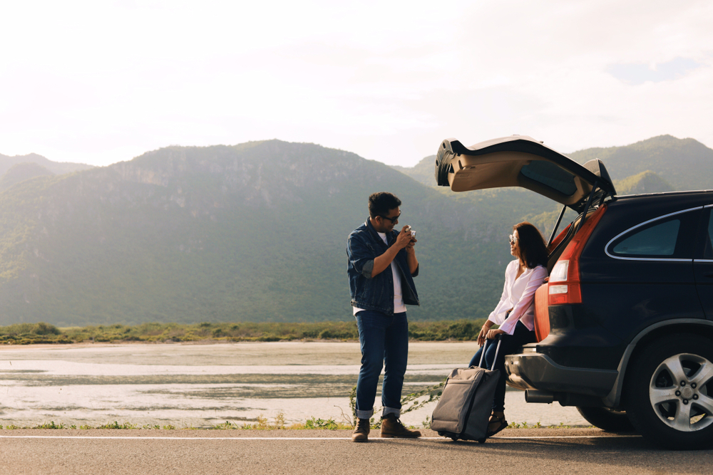 Two people on a road trip stopped having a conversation 