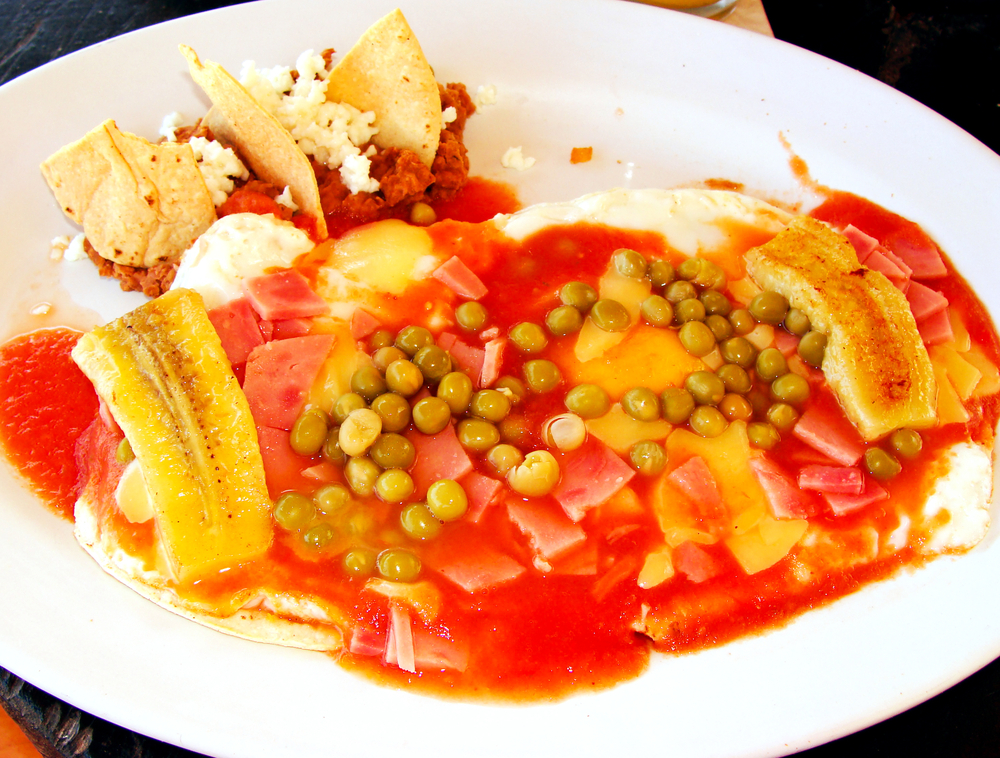 huevos motulenos is offered at Cafe Pasqual's which is one of the best restaurants in Santa Fe