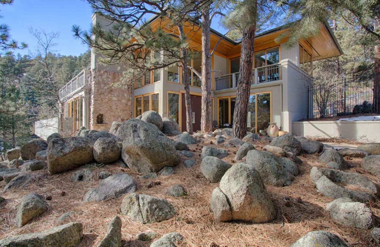 The exterior of a large villa in Boulder Colorado on a sunny day